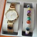 Close-up of a gold quartz watch and colorful beaded bracelet set in a gift box - Gold Watch Colorful Beaded Bracelet Set