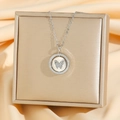 Zilveren titanium ketting met zirkonia vlinder hanger op een sieraden geschenkdoos - Draaibare zilveren vlinder (8764)
