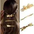 Set of 3 geometric brushed gold hair clips in butterfly, bow, and bar silhouettes - Set 11 (3 Pieces)