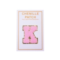 Detail of pink chenille letter K patch with gold glitter edge and self-adhesive backing - Letter K