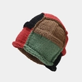 Detail of color-block knit beanie showing thick patchwork texture and handcrafted yarn - One Size / Burgundy