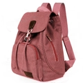 Vintage brick red canvas backpack with brown leather accents and metal buckle closure - Canvas / Red