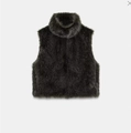 Detailed view of black faux fur high-neck vest with a soft textured finish - Black