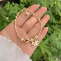 Detail of gold snake chain bracelet with red enamel heart charms and ME and YOU engraving - Red Heart ME-YOU Letters Style
