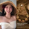 Set collana e orecchini con rose dorate vintage in stile floreale cavo elegante - Rame / Collana / Oro