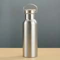 Close-up of stainless steel water bottle featuring a bamboo lid and metal handle - 350ml / Steel Color