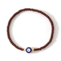 Handcrafted red bead bracelet with blue evil eye charm and gold-toned spacers - Reddish Brown