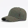 Classic houndstooth baseball cap in brown and blue tweed fabric from a side 45-degree angle - Adjustable / Green & Brown