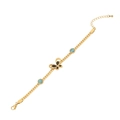 Goldene Schmetterlingskette mit schwarzem Anhänger und blauen Steinen auf Weiß - 2# Armband / Gold