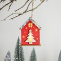 Lighted red wooden Christmas cabin ornament with snow roof and tree cutout detail - Red Christmas Tree Cabin Hanging