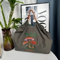 Dark grey nylon tote bag with colorful mushroom embroidery and woven rope handles - Gray Mushroom