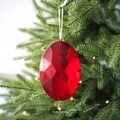 Sparkling red faceted Christmas tree ornament hanging with white ribbon - Oval Gemstone / Red