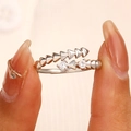 Silver bow-shaped open ring with geometric scales and clear cubic zirconia stones - Silver Geometric Scales Open Ring (12302)
