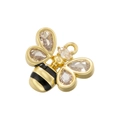 Macro shot of gold bee pendant with black enamel stripes and clear faceted gemstones - VD1689 Gold Zircon Bee