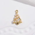 Macro shot of gold Christmas tree pendant with inlaid pearls and zircon stones - VD1643 Gold Pearl Christmas Tree