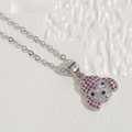 Macro shot of a cute puppy pendant with pink and white cubic zirconia on a silver chain - Rose Red Zirconia (Silver)