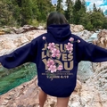 Oversized navy blue hoodie with pink cherry blossom and Jesus Loves You back print - S / Navy Blue