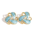 316L stainless steel triangle stud earrings with blue enamel swirl pattern in gold - Gold + Blue
