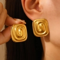 Golden square earrings with spiral embossed texture worn by a fashion model - 18K Gold Square (K-836)