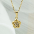 Detail view of a gold floral pendant featuring micro-paved sparkling cubic zirconia - Flower Shape Pendant