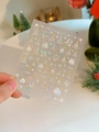 Macro shot of laser gold Christmas nail stickers with fireworks and snowflake designs - Laser Bronzing YT4635lspro