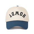 Close-up of HOWDY embroidery on a two-tone cotton baseball cap with contrast brim - Beige/Dark Blue