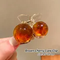 Brown cherry-shaped hair clip in translucent amber resin with metal spring, size 4.5x3.5cm - 20# Brown Cherry Clip - Approx. 3.5cm