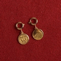 Golden S925 silver earring charm with lucky tiger coin pendant on red textured background - Tiger Round Tag (G)T019