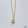 Detailed close-up of a golden geometric pendant with a round white pearl on a fine chain - Gold (D678)