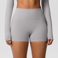 Detailed shot of high-waist light grey yoga shorts with supportive elastic compression fabric - 7101 Shorts - Frost Grey / S