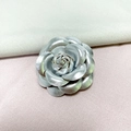 Elegant silver camellia flower brooch with layered petals and metallic finish - Silver