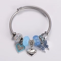 Detail of silver beaded bracelet with heart and butterfly charms featuring Lovely engraving - Blue Series (Style 2)