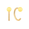 Detailed view of C-shaped gold-plated silver earrings with pale yellow bead accents - Yellow
