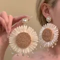 Detail of sunflower tassel earrings with woven petals and sparkling crystal pendants - Sunflower Rhinestone Tassel Style / 6# 925 Sterling Silver Earring Post - Gold - White - Brown