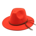 Detail of orange wool fedora hat featuring a brown braided rope band and long side tassels - M (56-58cm) / Orange Red