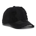 Detailed close-up of distressed denim baseball cap showing vintage ripped holes and frayed edges - Black(E)