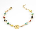 Golden stainless steel evil eye bracelet featuring colorful enamel beads and letter S tag - Letter S