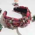 Close-up of red plaid headband with rhinestones and beads in Christmas decor scene - Red, Yellow and Black with Rhinestones