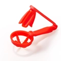 Handheld red plastic tomato and grape slicer tool shown on a clean white background - Red