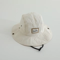 Detail of off-white quick-dry sun hat with adjustable wind rope and bear embroidery patch - Off White / 52cm