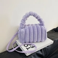 Purple plush tote bag with vertical texture and furry top handle on a stylish background - Purple