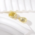 Elegant gold oval huggie earrings with star-shaped zircon inlays on art stone base - Star Zirconia Inlaid Ear Buckle / Gold