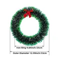 Guirnalda de Navidad con espumillón verde y negro y un gran lazo rojo en aro de hierro - Verde Clásico-25cm