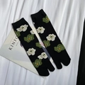 Japanese style black cotton tabi socks featuring white and green floral jacquard patterns - 35-41 / Black Smile Flower