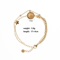 Detail of double-layer gold coin bracelet with star charm and sparkling crystals - Style 7-Queen Coin Star