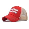 Detail of red and beige mesh trucker hat featuring white Wonder Wonder lettering print - Red