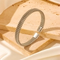 Braided stainless steel open cuff bracelet with flat woven texture in polished silver finish - Steel Color