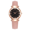 Women's starry sky watch with rose gold case and pink leather strap in a top view - Pink