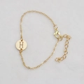 Gold chain bracelet with hollow round pendant featuring the letter H and lobster clasp - Gold H