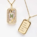 Gouden dierenriem ketting met groene kristallen, parelmoer en gegraveerde hanger achter - Vissen (gegraveerd)